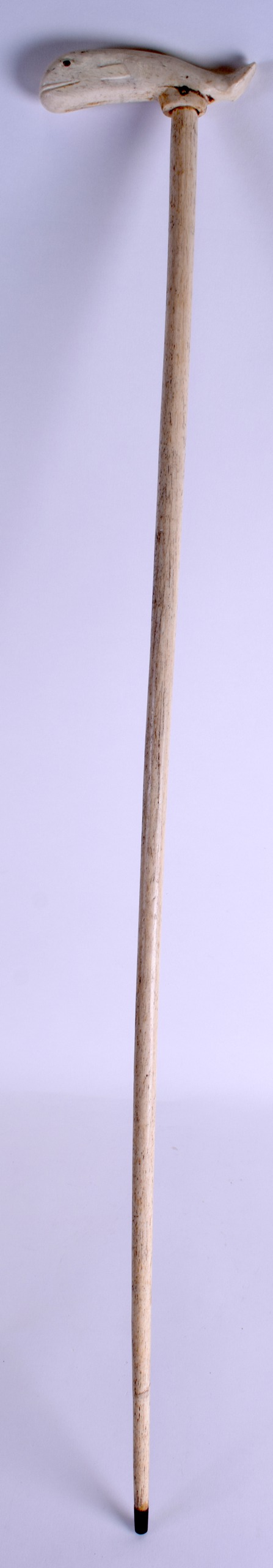 A RARE 19TH CENTURY CARVED WHALE BONE WALKING CANE with naively carved terminal. 93 cm x 12 cm. - Image 3 of 3