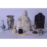 A CHINESE STATUE OF BUDDHA, together with a blue and white vase, silver figure etc. (qty)