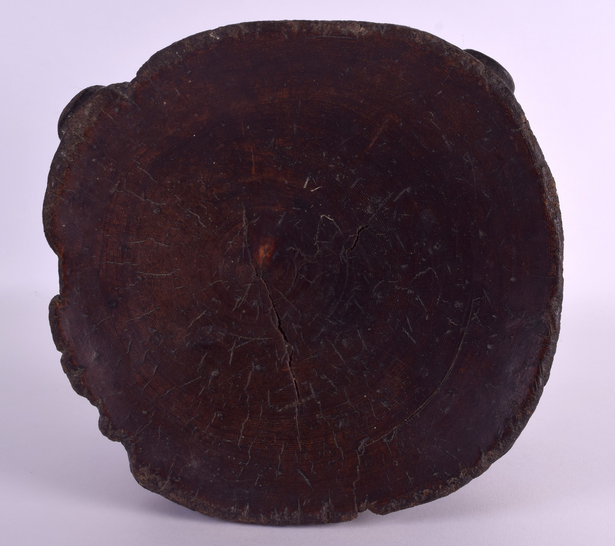 AN EARLY 20TH CENTURY AFRICAN TRIBAL CARVED WOOD STOOL possibly Tanzanian, with dish shaped top. - Image 3 of 3