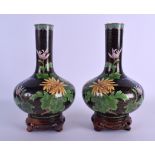 A PAIR OF CHINESE REPUBLICAN PERIOD CLOISONNE ENAMEL VASES decorated with floral sprays. Vase 21