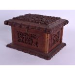 A 19TH CENTURY CHINESE CARVED SANDALWOOD CASKET AND COVER Qing, decorated with floral sprays and