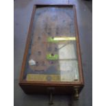 A VINTAGE BAGATELLE GAME, "10 balls for 1p". 58 cm long.