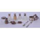 A SET OF FOUR SILVER AND MOTHER OF PEARL TOP CONDIMENTS, together with a pair of silver napkin