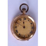 AN EDWARDIAN 9CT GOLD FOB WATCH. 26.4 grams overall. 3 cm diameter.