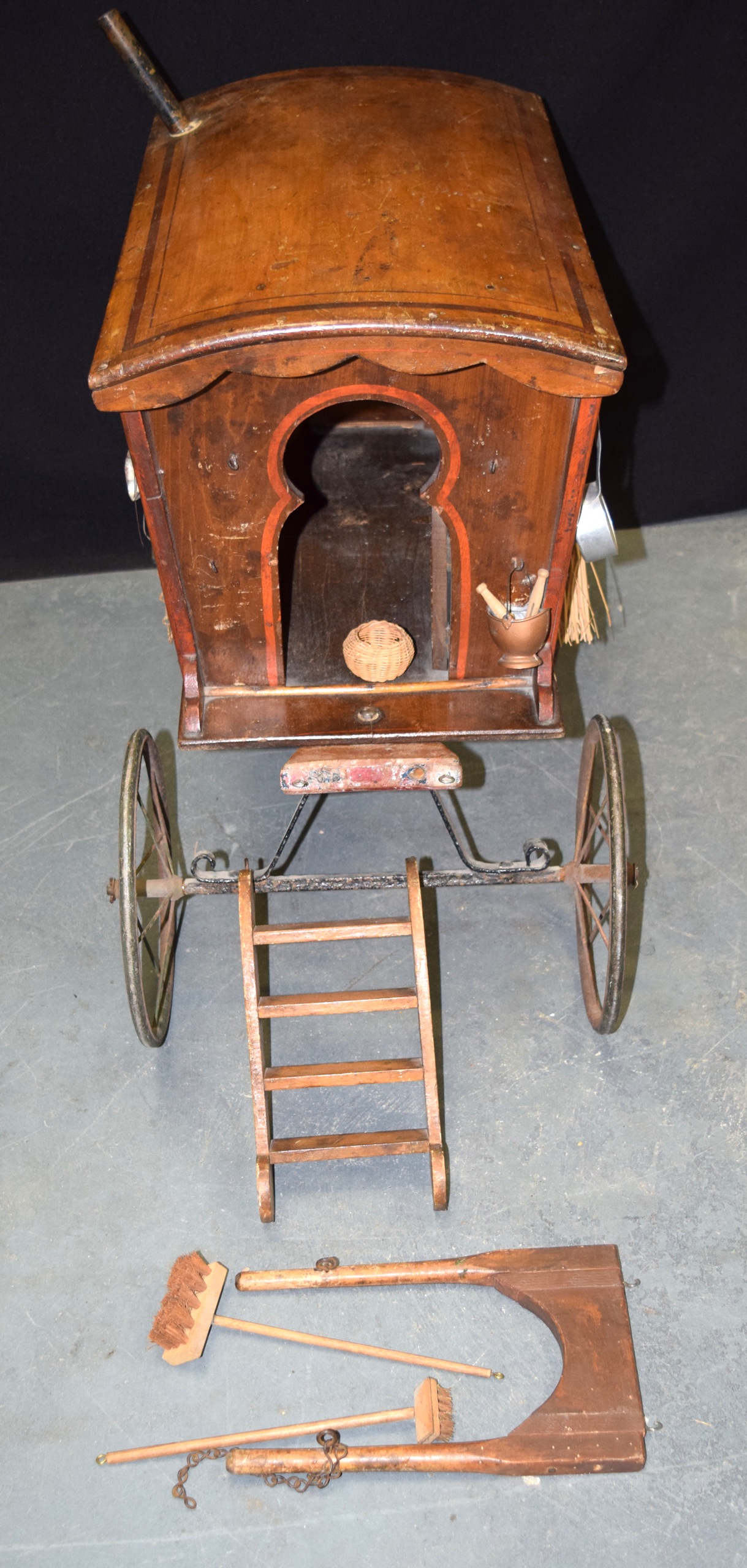 AN EARLY 20TH CENTURY EUROPEAN CARVED WOOD GYPSY WAGON with several additions and hanging pots & - Image 2 of 4