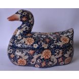 A LARGE 20TH CENTURY IMARI POTTERY BOX, in the form of a duck with enamelled feathers. 35 cm wide.