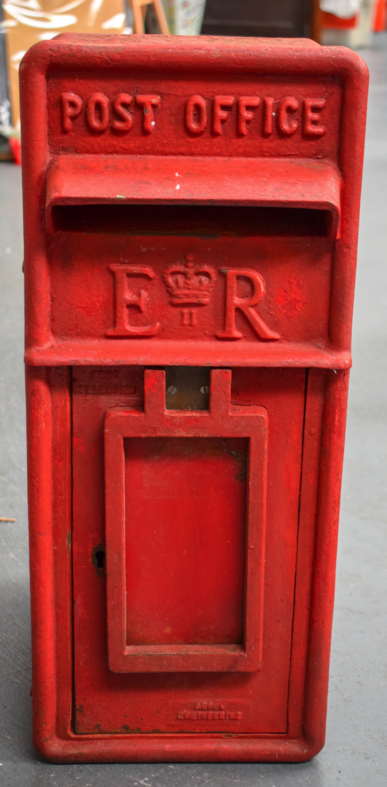 MID 20TH CENTURY CAST IRON POST BOX, "ER II". 61 cm x 26 cm.