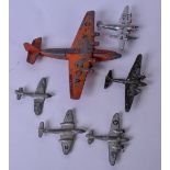 A GROUP OF SIX 1940'S METAL TOY AEROPLANES, detailed list attached. Largest 15 cm wide.