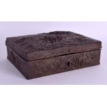 A RARE 19TH CENTURY JAPANESE MEIJI PERIOD IRON CASKET AND COVER decorated in relief with flowering