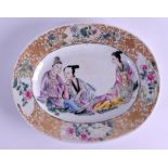 A CHINESE FAMILLE ROSE PORCELAIN DISH 20th Century, painted with three females within a rich gilt