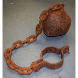 AN ANTIQUE PRISONERS CAST IRON BALL AND CHAIN, 18th century.