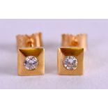 A PAIR OF 9CT GOLD AND DIAMOND EARRINGS.