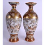 A LARGE PAIR OF LATE 19TH CENTURY JAPANESE KUTANI PORCELAIN VASES painted with figures within