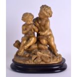 A 19TH CENTURY FRENCH GILT BRONZE FIGURE OF TWO PUTTI in the manner of Clodion, modelled playing a