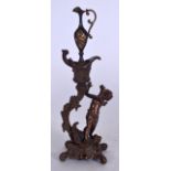 AN EARLY 20TH CENTURY BRONZE FIGURE, in the form of a cherub holding aloft an urn. 25 cm high.