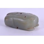 AN 18TH/19TH CENTURY CHINESE CARVED JADE JOSS STICK HOLDER Jiaqing, in the form of a recumbent