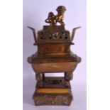 A LARGE 19TH CENTURY CHINESE TWIN HANDLED BRONZE CENSER ON STAND with Buddhistic lion terminal. 41