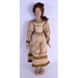 A FINE AND RARE MID 18TH CENTURY EUROPEAN WOODEN DOLL modelled in beige robes, highlighted in