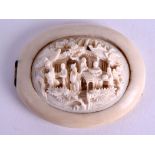 AN UNUSUAL 19TH CENTURY CHINESE CANTON CARVED IVORY LOCKET decorated with figures in landscapes. 6.5