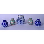 A PAIR OF CHINESE TURQUOISE GROUND PORCELAIN VASES, together with three blue and white ginger