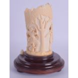 A FINE 19TH CENTURY INDIAN CARVED IVORY TUSK VASE converted to a lamp, decorated with figures