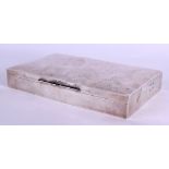 A LARGE EDWARDIAN SILVER CIGARETTE BOX. London 1910. 35 oz inc liner. 22 cm x 13.5 cm.