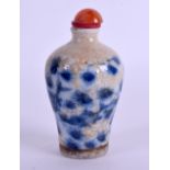A 19TH CENTURY CHINESE CRACKLE GLAZED PORCELAIN SNUFF BOTTLE Qing, painted with fish swimming. 7.5