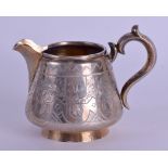 A 19TH CENTURY RUSSIAN ENGRAVED SILVER CREAM JUG decorated with a floral banding. 4.5 oz. 10 cm