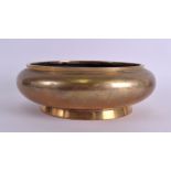 A MID 19TH CENTURY CHINESE POLISHED BRONZE CENSER bearing Xuande marks to base, of plain squat