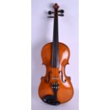 A TWO PIECE BACK VIOLIN with label to interior 'Townson's Piano, Organ and Musical Instrument