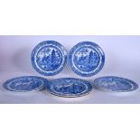 A SET OF FIVE EARLY 19TH CENTURY SPODE BLUE AND WHITE PLATES, circa 1810, decorated with forest