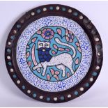 AN UNUSUAL 19TH CENTURY MIDDLE EASTERN PERSIAN ENAMEL AND COPPER DISH decorated with a prancing