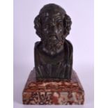 A 19TH CENTURY ITALIAN GRAND TOUR BUST OF HOMER modelled upon a veined marble base. 25 cm high.