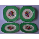 A SET OF FOUR ART DECO WEDWOOD PORCELAIN PLATES, with green border and decorated with flowers. 21.