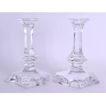 A PAIR OF FRENCH VAL ST LAMBERT CRYSTAL GLASS CANDLESTICKS. 18 cm high.