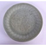 AN EARLY 20TH CENTURY CHINESE CELADON MOULDED DISH Late Qing, decorated with motifs. 17 cm