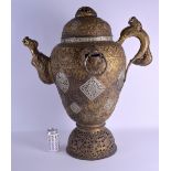 A VERY LARGE 19TH CENTURY CHINESE SINO TIBETAN COPPER AND BRASS EWER decorated with open work panels