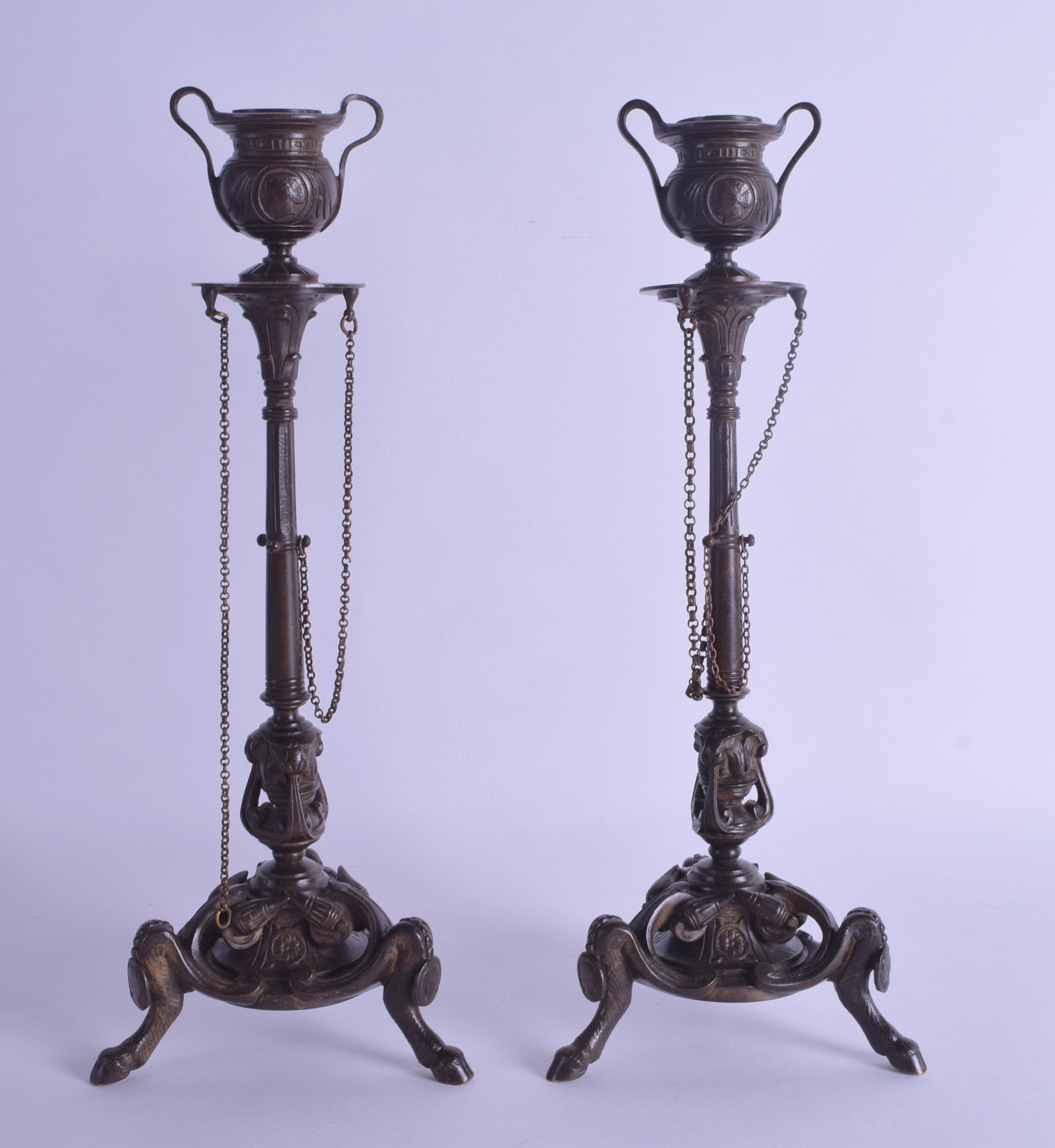 A PAIR OF 19TH CENTURY FRENCH BRONZE CANDLESTICKS modelled upon tapering columns, the bases with - Image 2 of 2