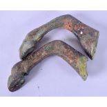 A PAIR OF ANTIQUE BRONZE HORSE LEGS, probably Middle Eastern. 10 cm long.