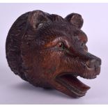 A LATE 19TH CENTURY BAVARIAN BLACK FOREST CARVED BEAR WALL PLAQUE possibly a pocket watch hanging