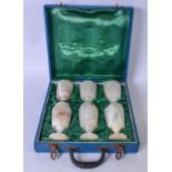 A SET OF SIX HARDSTONE GOBLETS, contained within a fitted case. Cups 12.5 cm high.