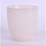AN EARLY 20TH CENTURY CHINESE CARVED JADE BEAKER Qing/Republic, of plain form. 7.5 cm high.