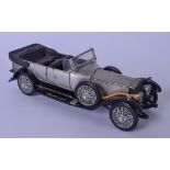 A VINTAGE FRANKLIN MINT MODEL OF ROLLS ROYCE SILVER GHOST, formed with moveable parts. 21 cm wide.