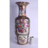 A VERY LARGE 19TH CENTURY CHINESE CANTON FAMILLE ROSE PORCELAIN VASE painted with figures in