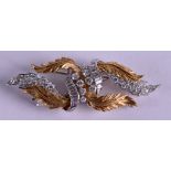 A FINE 18CT GOLD AND PLATINUM VAN CLEEF & ARPELS DIAMOND BROOCH approx. 1.2 cts, of highly elegant