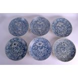 A GROUP OF SIX 16TH/17TH CENTURY CHINESE BLUE AND WHITE DISHES Ming, painted with birds, foliage and