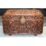 A FINE 19TH CENTURY CHINESE CARVED HARDWOOD COFFER Qing, decorated with dragons pursuing flaming