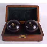A CHARMING PAIR OF VICTORIAN CASED CARPET BOWLS presented to Mr Thomas Whitehead to James Pass
