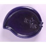 A CHINESE AUBERGINE GLAZED BRUSH WASHER 20th Century, of naturalistic form. 11 cm x 8.25 cm.