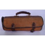 A SET OF THREE ANTIQUE HARDWOOD BOULES, containing within a carry case.